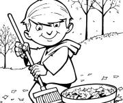 Coloriage Gar&ccedil;on et les feuilles d'automne pour la f&ecirc;te Action De Gr&acirc;ce