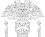 Coloriage Chauve-souris sur cr&acirc;ne avec chandelle de Halloween