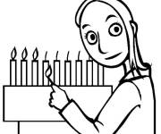 Coloriage et dessins gratuit La fille allumant la Menorah pendant le hanoucca à imprimer