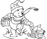 Coloriage Winny content d'avoir un cadeau de Noël