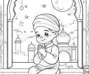 Coloriage Enfant musulman priant sur le th&egrave;me de Ramadan
