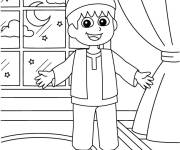 Coloriage Gar&ccedil;on levant sa main pour c&eacute;l&eacute;brer le Ramadan