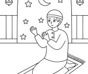 Coloriage Jeune homme en priant &agrave; la mosqu&eacute;e pendant le Ramadan