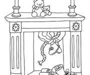 Coloriage Un lutin de St Nicolas dans la chemin&eacute;e