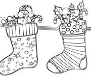 Coloriage Beaucoup de cadeaux de noel cachés dans les chaussettes