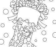 Coloriage Bonhomme de neige et des bonbons dans la chaussette de noel