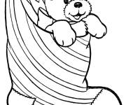 Coloriage Chiot cach&eacute; dans une botte de noel