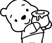Coloriage B&eacute;b&eacute; Winnie aime le miel