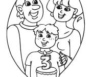 Coloriage et dessins gratuit La famille célèbrent l'anniversaire de leur garçon à imprimer