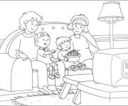 Coloriage La famille regarde un film