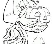 Coloriage Frankenstein en volant la citrouille de Halloween