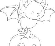 Coloriage Chauve-souris heureux avec citrouille pour Halloween
