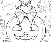 Coloriage Petite chauve-souris assise sur une citrouille Halloween