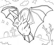 Coloriage Une chauve-souris effrayante survole un cimeti&egrave;re &agrave; Halloween