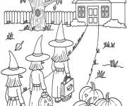 Coloriage Les sorci&egrave;res tenant des citrouille de Halloween d&eacute;cor&eacute;s