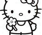 Coloriage et dessins gratuit Hello Kitty offre une fleur à imprimer