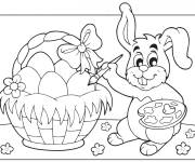 Coloriage Artiste Lapin de P&acirc;ques qui peigne les oeufs