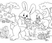 Coloriage Deux Lapins de P&acirc;ques en cachant les oeufs sucr&eacute;s