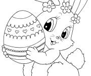 Coloriage Gentil lapin portant un oeuf de P&acirc;ques &agrave; imprimer
