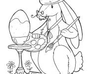 Coloriage Image du lapin qui peint les oeufs de P&acirc;ques