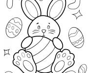Coloriage Joyeux lapin de P&acirc;ques &eacute;treignant l'oeuf