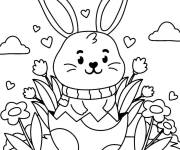 Coloriage et dessins gratuit Lapin assis &agrave; l'int&eacute;rieur d'un &oelig;uf de P&acirc;ques à imprimer