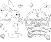 Coloriage Lapin avec un panier d'oeuf de P&acirc;ques dans le jardin
