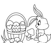 Coloriage Lapin avec un panier rempli d'oeuf de P&acirc;ques