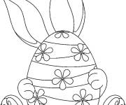 Coloriage Lapin cach&eacute; derri&egrave;re un oeuf de p&acirc;ques maternelle