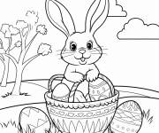Coloriage Lapin dans un panier de P&acirc;ques dans la foret