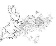 Coloriage Lapin de P&acirc;ques avec des plantes et oeufs en d&eacute;coration