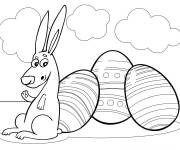 Coloriage Lapin de P&acirc;ques avec trois &oelig;ufs