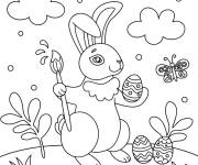 Coloriage Lapin de P&acirc;ques avec un pinceau pour la d&eacute;coration