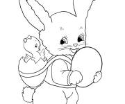 Coloriage Lapin de P&acirc;ques avec un poussin sur le dos