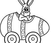 Coloriage Lapin de P&acirc;ques conduisant une voiture en forme d'oeuf
