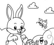 Coloriage et dessins gratuit Lapin de P&acirc;ques debout &agrave; c&ocirc;t&eacute; d'un poulet à imprimer
