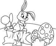Coloriage Lapin de P&acirc;ques debout sur un tronc d'arbre