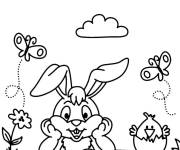 Coloriage et dessins gratuit Lapin de P&acirc;ques entour&eacute; de papillons dans la belle nature de l'au à imprimer