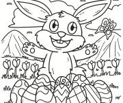 Coloriage Lapin de P&acirc;ques parmi le champs des tulipes