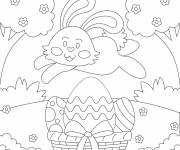 Coloriage Lapin de p&acirc;ques parmi les arbres gratuit