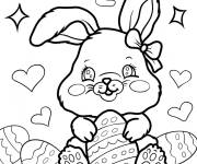 Coloriage Lapin de P&acirc;ques poilu &eacute;treignant les &oelig;ufs de P&acirc;ques