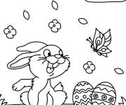 Coloriage et dessins gratuit Lapin de P&acirc;ques souriant &agrave; un papillon à imprimer
