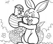 Coloriage Lapin de P&acirc;ques tenant un &oelig;uf de P&acirc;ques avec un poussin &agrave; l'int&eacute;r