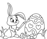 Coloriage Lapin en d&eacute;corant l'oeuf de P&acirc;ques