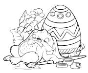 Coloriage Lapin endormi sur un oeuf de p&acirc;ques