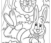 Coloriage Lapin r&ecirc;vant des oeufs de P&acirc;ques
