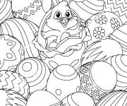 Coloriage Lapin se trouve parmi des oeufs de p&acirc;ques