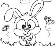Coloriage Lapin serrant un &oelig;uf de P&acirc;ques dans ses bras