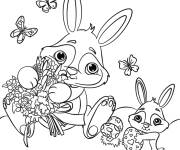 Coloriage Lapins avec des oeufs de P&acirc;ques entres les papillons