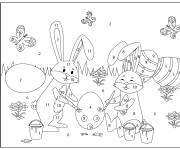 Coloriage Lapins de P&acirc;ques peignant des &oelig;ufs num&eacute;rot&eacute;